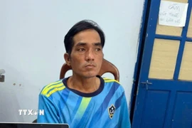 Đối tượng Hợp tại cơ quan công an. (Ảnh: TTXVN phát)