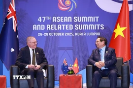 Thủ tướng Phạm Minh Chính gặp Thủ tướng Australia Anthony Albanese. (Ảnh: Dương Giang/TTXVN)