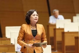 Thống đốc Ngân hàng Nhà nước Việt Nam Nguyễn Thị Hồng giải trình làm rõ ý kiến Đại biểu Quốc hội. (Ảnh: Phương Hoa/TTXVN)