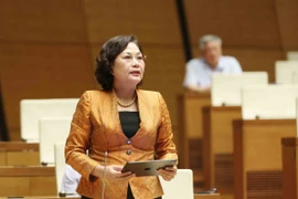 Thống đốc Ngân hàng Nhà nước Việt Nam Nguyễn Thị Hồng giải trình làm rõ ý kiến Đại biểu Quốc hội. (Ảnh: Phương Hoa/TTXVN)