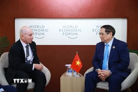 Thủ tướng Phạm Minh Chính tiếp ông Dave West, Chủ tịch Tập đoàn Cisco. (Ảnh: Dương Giang/TTXVN)