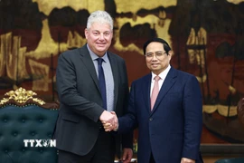 Thủ tướng Phạm Minh Chính tiếp ông Eduard Stiphout - Phó Chủ tịch Cấp cao, Tập đoàn ASML (Hà Lan). (Ảnh: Dương Giang/TTXVN)