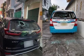 Nhiều ôtô bị Long đập vỡ kính. (Nguồn: Báo Lâm Đồng)