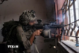 Binh sỹ Israel trong chiến dịch quân sự tại Dải Gaza. (Ảnh: THX/TTXVN)