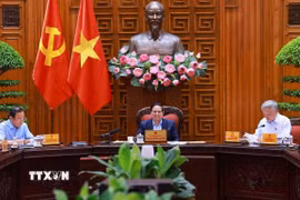Thủ tướng Phạm Minh Chính chủ trì cuộc họp Thường trực Chính phủ về trung tâm tài chính quốc tế tại Thành phố Hồ Chí Minh và Đà Nẵng. (Ảnh: Dương Giang/TTXVN)