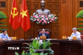 Thủ tướng Phạm Minh Chính chủ trì cuộc họp Thường trực Chính phủ về trung tâm tài chính quốc tế tại Thành phố Hồ Chí Minh và Đà Nẵng. (Ảnh: Dương Giang/TTXVN)
