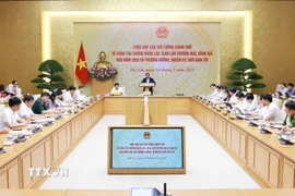 Thủ tướng Phạm Minh Chính chủ trì cuộc họp về công tác chống buôn lậu, gian lận thương mại, hàng giả. (Ảnh: Dương Giang/TTXVN)