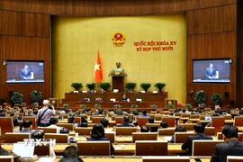 Bộ trưởng Bộ Tài chính Nguyễn Văn Thắng giải trình, làm rõ một số vấn đề đại biểu Quốc hội nêu. (Ảnh: Doãn Tấn/TTXVN)