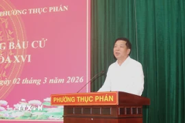 Thiếu tướng Trần Hồng Minh, Ủy viên Ban Chấp hành Trung ương Đảng, Ủy viên Ban Chấp hành Đảng bộ Chính phủ, Bí thư Đảng bộ, Bộ trưởng Bộ Xây dựng, trình bày chương trình hành động. (Ảnh: Chu Hiệu/TTXVN)