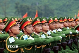 Khối chiến sỹ Công an nhân dân tham gia tổng hợp luyện lực lượng diễu binh, diễu hành thực hiện nhiệm vụ A80. (Ảnh: Tuấn Anh/TTXVN)