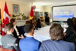 Các thành viên đoàn công tác tại Hội thảo. (Ảnh: Thanh Hải/TTXVN)