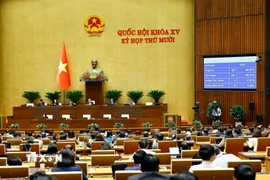 Quốc hội biểu quyết thông qua Luật sửa đổi, bổ sung một số điều của Luật Chuyển giao công nghệ. (Ảnh: Doãn Tấn/TTXVN)