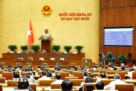 Quốc hội biểu quyết thông qua Nghị quyết về phương án phân bổ ngân sách trung ương năm 2026. (Ảnh: Doãn Tấn/TTXVN)