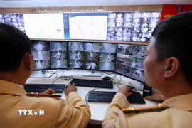 Camera giám sát được bố trí tại gần 200 nút giao khắp thành phố Hà Nội. (Ảnh: Phạm Kiên/TTXVN)