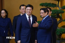 Thủ tướng Phạm Minh Chính tiếp ông Vi Thao, Chủ tịch Khu tự trị dân tộc Choang Quảng Tây, Trung Quốc. (Ảnh: Dương Giang/TTXVN)