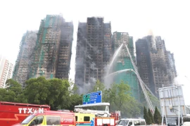 Hiện trường vụ cháy sáng 27/11. (Ảnh: Xuân Vịnh/TTXVN)