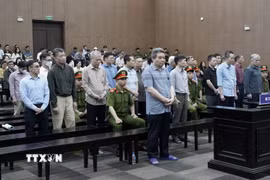 Các bị cáo tại phiên tòa sáng 1/4. (Ảnh: Kim Anh/TTXVN)