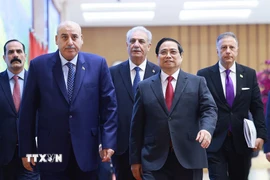 Thủ tướng Phạm Minh Chính hội kiến Chủ tịch Hạ viện Vương quốc Hashemite Jordan Mazen Turki El Qadi. (Ảnh: Dương Giang/TTXVN)