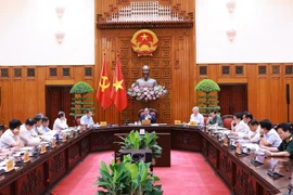 Thủ tướng Phạm Minh Chính chủ trì cuộc họp Thường trực Chính phủ về trung tâm tài chính quốc tế tại Thành phố Hồ Chí Minh và Đà Nẵng. (Ảnh: Dương Giang/TTXVN)