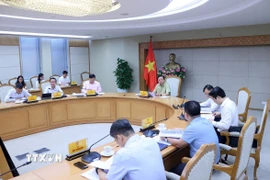 Phó Thủ tướng Trần Hồng Hà chủ trì cuộc họp. (Ảnh: Văn Điệp/TTXVN)