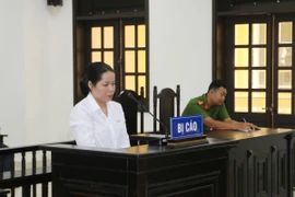 Bị cáo Lê Thị Ngân tại phiên tòa. (Ảnh: Chanh Đa/TTXVN)