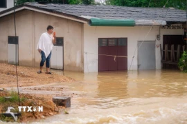 Cảnh ngập lụt sau những trận mưa lớn tại tỉnh Songkhla, Thái Lan. (Ảnh: THX/TTXVN)