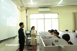 Các thí sinh tham gia kỳ thì đánh giá năng lực chuyên biệt tại trường Đại học Sư phạm Thành phố Hồ Chí Minh sáng 26/3. (Ảnh: Thu Hoài/Vietnam+)