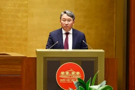 Bộ trưởng Bộ Tư pháp Nguyễn Hải Ninh phát biểu giải trình, làm rõ một số vấn đề đại biểu Quốc hội nêu. (Ảnh: Doãn Tấn/TTXVN)