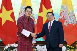 Thủ tướng Phạm Minh Chính hội kiến Quốc vương Bhutan Jigme Khesar Namgyel Wangchuck đang thăm cấp Nhà nước tới Việt Nam. (Ảnh: Dương Giang/TTXVN)