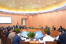 Quang cảnh cuộc họp. (Nguồn: Ủy ban Nhân dân thành phố Hà Nội)