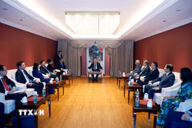 Tổng Bí thư, Chủ tịch nước Tô Lâm và Phu nhân gặp mặt thân nhân các tướng lĩnh, chuyên gia, nhân sỹ hữu nghị Việt Nam-Trung Quốc. (Ảnh: Thống Nhất/TTXVN)