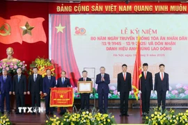 Tổng Bí thư Tô Lâm trao tặng Danh hiệu Anh hùng Lao động cho Tòa án Nhân dân Tối cao ngày 13/9/2025. (Ảnh: Phạm Kiên/TTXVN)