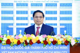 Thủ tướng Phạm Minh Chính phát biểu tại Lễ kỷ niệm 30 năm thành lập Đại học Quốc gia Thành phố Hồ Chí Minh. (Ảnh: Dương Giang/TTXVN)