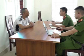 Đối tượng Vũ Anh Tuấn tại cơ quan công an. (Nguồn: Công an Nghệ An)