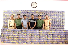 2 đối tượng cùng tang vật tại cơ quan công an. (Nguồn: Bộ Công an)