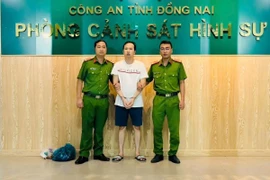 Đối tượng Trần Thanh Hải tại cơ quan điều tra. (Ảnh: TTXVN phát)