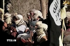 Các tay súng al-Qaeda ở Bán đảo Arab (AQAP) tại một địa điểm bí mật ở Yemen. (Ảnh: AFP/TTXVN)