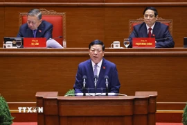 Đồng chí Trần Hồng Minh, Ủy viên Trung ương Đảng, Bí thư Đảng ủy, Bộ trưởng Bộ Xây dựng, tham luận về vấn đề “Đột phá mạnh mẽ phát triển kết cấu hạ tầng trong kỷ nguyên mới. (Ảnh: TTXVN)