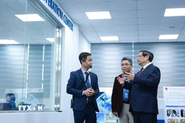 Thủ tướng Phạm Minh Chính tham quan Trung tâm tham quan Trung tâm vũ trụ Việt Nam tại Khu Công nghệ cao Hòa Lạc. (Ảnh: Dương Giang/TTXVN)