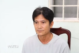 Đối tượng Lê Hoàng Ân tại Cơ quan điều tra. (Ảnh: TTXVN phát)