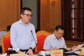 Ông Lê Quốc Minh, Ủy viên Trung ương Đảng, Tổng Biên tập báo Nhân Dân phát biểu tại buổi làm việc. (Ảnh: Thành Phương/TTXVN)