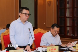 Ông Lê Quốc Minh, Ủy viên Trung ương Đảng, Tổng Biên tập báo Nhân Dân phát biểu tại buổi làm việc. (Ảnh: Thành Phương/TTXVN)