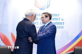 Thủ tướng Phạm Minh Chính gặp Thủ tướng Timor-Leste Xanana Gusmao. (Ảnh: Dương Giang/TTXVN)