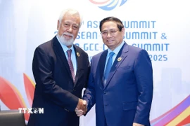 Thủ tướng Phạm Minh Chính gặp Thủ tướng Timor-Leste Xanana Gusmao. (Ảnh: Dương Giang/TTXVN)