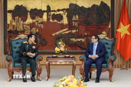 Quang cảnh buổi hội đàm giữa đoàn đại biểu quân sự cấp cao Quân đội Nhân dân Việt Nam và đoàn đại biểu quân sự cấp cao Quân đội Nhân dân Lào. (Ảnh: Trọng Đức/TTXVN)