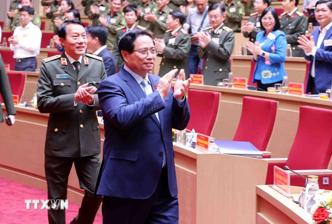 ttxvn-thu-tuong-du-hoi-nghi-so-ket-01-nam-trien-khai-luc-luong-tham-gia-bao-ve-an-ninh-trat-tu-o-co-so-8402888-1.jpg