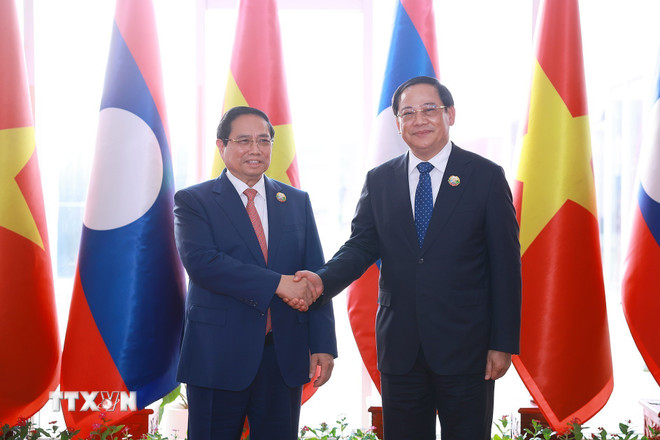 ttxvn-thu-tuong-pham-minh-chinh-du-hoi-nghi-xuc-tien-dau-tu-viet-nam-lao-nam-2025-8448639-3.jpg