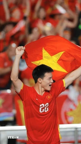 Các cầu thủ U22 Việt Nam hân hoan trong niềm vui chiến thắng. (Ảnh: Minh Quyết/TTXVN)