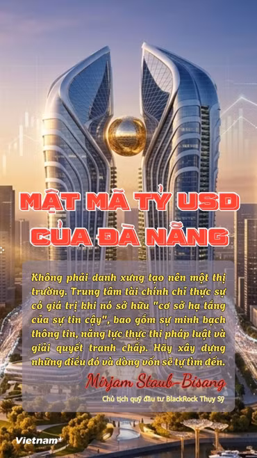 Trao biên bản ghi nhớ hợp tác giữa thành phố Đà Nẵng và các tổ chức trong và ngoài nước về việc phát triển Trung tâm tài chính Quốc tế Đà Nẵng. (Ảnh: Thanh Phong/Vietnam+)