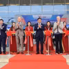 Lãnh đạo Bộ Xây dựng, Ban tổ chức cắt băng khai mạc Triển lãm quốc tế lần thứ 10 về công nghệ đóng tàu và công trình ngoài khơi. (Ảnh: Việt Hùng/Vietnam+)
